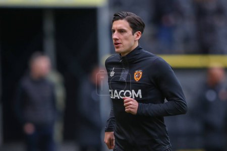 Photo for Alfie Jones #5 of Hull City during the pre-game warm up ahead of the Emirates FA Cup Third Round match Hull City vs Fulham at MKM Stadium, Hull, United Kingdom, 7th January 202 - Royalty Free Image