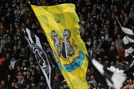 Photo for Newcastle fans wave flags during the Carabao Cup Quarter Final match Newcastle United vs Leicester City at St. James's Park, Newcastle, United Kingdom, 10th January 202 - Royalty Free Image