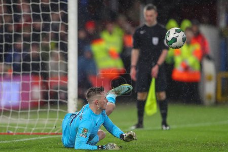 Photo for Dean Henderson #1 of Nottingham Forest saves a penalty from Rubn Neves #8 of Wolverhampton Wanderers during the Carabao Cup Quarter Final match Nottingham Forest vs Wolverhampton Wanderers at City Ground, Nottingham, United Kingdom, 11th January 2023 - Royalty Free Image
