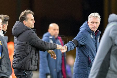 Photo for Wolverhampton Wanderers Manager Julen Lopetegui and West Ham United Manager David Moyes sahkes hands after the Premier League match Wolverhampton Wanderers vs West Ham United at Molineux, Wolverhampton, United Kingdom, 14th January 202 - Royalty Free Image