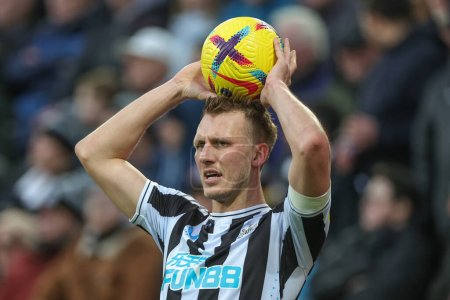 Photo for Dan Burn #33 of Newcastle United takes a throw in during the Premier League match Newcastle United vs Fulham at St. James's Park, Newcastle, United Kingdom, 15th January 202 - Royalty Free Image
