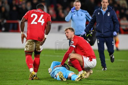 Photo for Dean Henderson #1 of Nottingham Forest goes down with a injury during the Premier League match Nottingham Forest vs Leicester City at City Ground, Nottingham, United Kingdom, 14th January 202 - Royalty Free Image