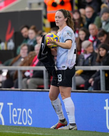 Photo for Megan Campbell #28 of Liverpool Women dries the ball as she prepares for a long throw during the The Fa Women's Super League match Manchester United Women vs Liverpool Women at Leigh Sports Village, Leigh, United Kingdom, 15th January 202 - Royalty Free Image