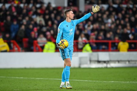 Photo for Dean Henderson #1 of Nottingham Forest gives his team instructions during the Premier League match Nottingham Forest vs Leicester City at City Ground, Nottingham, United Kingdom, 14th January 202 - Royalty Free Image
