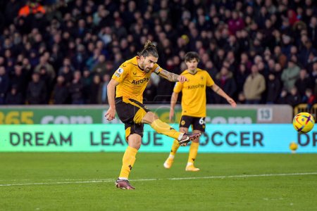 Photo for Ruben Neves #8 of Wolverhampton Wanderers has a shot during the Premier League match Wolverhampton Wanderers vs West Ham United at Molineux, Wolverhampton, United Kingdom, 14th January 202 - Royalty Free Image