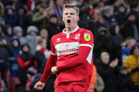Téléchargez les photos : Marcus Forss #21 of Middlesbrough gestures to the crowd after scoring the opening goal to make it 1-0 during the Sky Bet Championship match Middlesbrough vs Millwall at Riverside Stadium, Middlesbrough, United Kingdom, 14th January 202 - en image libre de droit