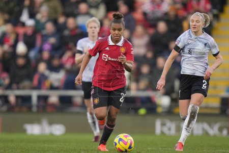 Photo for Nikita Parris #22 of Manchester United breaks past Emma Koivisto #2 of Liverpool Women during the The Fa Women's Super League match Manchester United Women vs Liverpool Women at Leigh Sports Village, Leigh, United Kingdom, 15th January 202 - Royalty Free Image