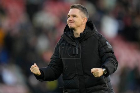 Photo for Marc Skinner the Manchester United Women's manager salutes the fans after the The Fa Women's Super League match Manchester United Women vs Liverpool Women at Leigh Sports Village, Leigh, United Kingdom, 15th January 202 - Royalty Free Image