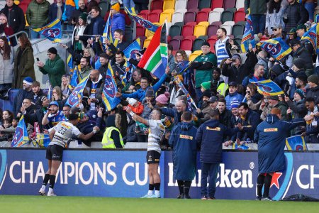 Photo for DHL Stormers applaud their players following victory over London Irish in the European Champions Cup match London Irish vs Stormers at the Gtech Community Stadium, Brentford, United Kingdom, 15th January 202 - Royalty Free Image