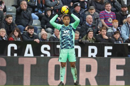 Photo for Kenny Tete #2 of Fulham takes a throw in during the Premier League match Newcastle United vs Fulham at St. James's Park, Newcastle, United Kingdom, 15th January 202 - Royalty Free Image
