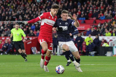 Téléchargez les photos : Matt Crooks #25 of Middlesbrough and Shaun Hutchinson #4 of Millwall tussle for the ball during the Sky Bet Championship match Middlesbrough vs Millwall at Riverside Stadium, Middlesbrough, United Kingdom, 14th January 202 - en image libre de droit