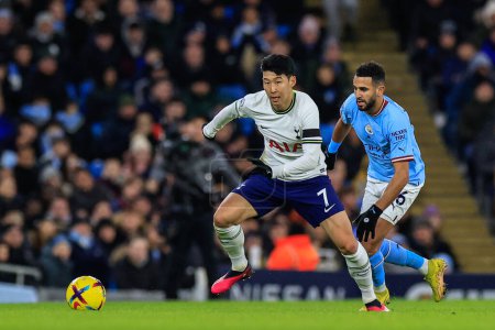 Photo for Son Heung-Min #7 of Tottenham Hotspur breaks as Riyad Mahrez #26 of Manchester City tracks him during the Premier League match Manchester City vs Tottenham Hotspur at Etihad Stadium, Manchester, United Kingdom, 19th January 202 - Royalty Free Image