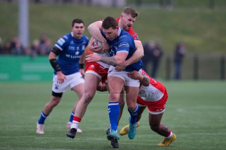 Foto de Jordan Lane #12 of Hull FC is tackled during the Rugby League Pre Season match Sheffield Eagles vs Hull FC at Sheffield Olympic Legacy Park, Sheffield, United Kingdom, 22nd January 202 - Imagen libre de derechos