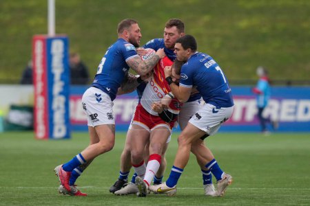Foto de Josh Griffin #23, Scott Taylor #30 and Jake Clifford #7 of Hull FC cobble to a tackle during the Rugby League Pre Season match Sheffield Eagles vs Hull FC at Sheffield Olympic Legacy Park, Sheffield, United Kingdom, 22nd January 202 - Imagen libre de derechos