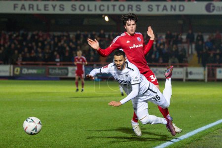 Foto de Dennon Lewis #15 of Boreham Wood is fouled by Doug Tharme #34 of Accrington Stanley during the Emirates FA Cup Third Round Replay match Accrington Stanley vs Boreham Wood at Wham Stadium, Accrington, United Kingdom, 24th January 202 - Imagen libre de derechos