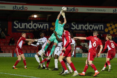 Photo for Toby Savin #40 of Accrington Stanley claims the cross during the Emirates FA Cup Third Round Replay match Accrington Stanley vs Boreham Wood at Wham Stadium, Accrington, United Kingdom, 24th January 202 - Royalty Free Image