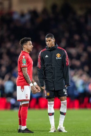 Téléchargez les photos : Jesse Lingard #11 of Nottingham Forest talks with Marcus Rashford #10 of Manchester United during the Carabao Cup Semi-Finals match Nottingham Forest vs Manchester United at City Ground, Nottingham, United Kingdom, 25th January 202 - en image libre de droit