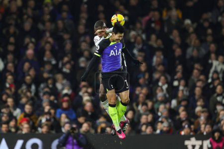 Photo for Issa Diop #31 of Fulham and Son Heung-Min #7 of Tottenham Hotspur battle for the ball during the Premier League match Fulham vs Tottenham Hotspur at Craven Cottage, London, United Kingdom, 23rd January 202 - Royalty Free Image