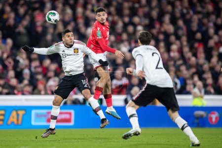 Téléchargez les photos : Morgan Gibbs-White #10 of Nottingham Forest heads the ball during the Carabao Cup Semi-Finals match Nottingham Forest vs Manchester United at City Ground, Nottingham, United Kingdom, 25th January 202 - en image libre de droit