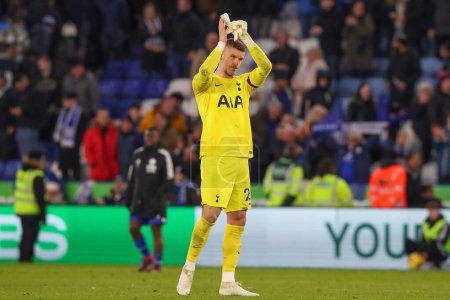 Photo for Fraser Forster #20 of Tottenham Hotspur applauds the travelling fans after the Premier League match Leicester City vs Tottenham Hotspur at King Power Stadium, Leicester, United Kingdom, 11th February 202 - Royalty Free Image