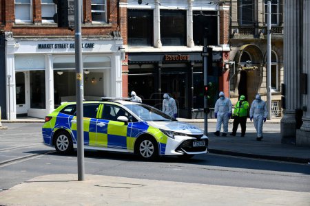 Photo for Forensic police officers searche the local area. Nottingham van attack: Three people dead and a man arrested after 'major incident' at Nottingham City,  Nottingham, United Kingdom, 13th June 2023 - Royalty Free Image