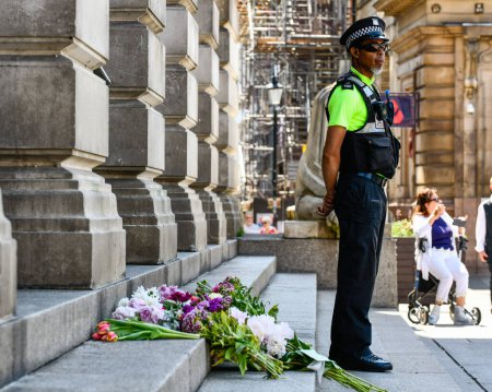 Photo for Nottingham attacks: Members of the public lay flowers at the Council House Building in the city centre today after yesterdays attacks which left 3 people dead and 3 injured Nottingham, United Kingdom, 13th June 2023 - Royalty Free Image