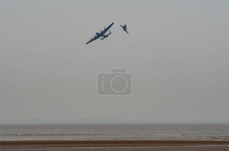 Photo for Lancaster of the Battle of Britain Memorial Flight and Typhoon Display Team display at Cleethorpes Armed Forces Day at Cleethorpes sea front, Cleethorpes, United Kingdom, 18th June 2023 - Royalty Free Image