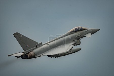 Photo for A Eurofighter Typhoon takes of as the Battle of Britain memorial flight and RAF Coningsby typhoon squadrons prepare for the flypast for Trooping the colour at RAF Coningsby, Coningsby, United Kingdom, 17th June 2023 - Royalty Free Image