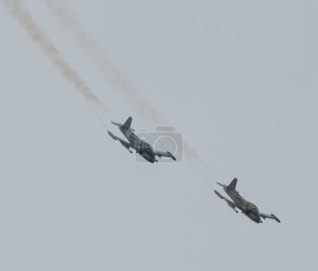 Photo for Strikemaster pair perform their display, during Rhyl Air Show 2023 at Rhyl Seafront, Rhyl, United Kingdom, 27th August 2023 - Royalty Free Image