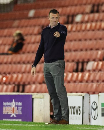 Photo for Neill Collins Head coach of Barnsley gives his team instructions  during the EFL Trophy match Barnsley vs Manchester City U21 at Oakwell, Barnsley, United Kingdom, 26th September 2023 - Royalty Free Image