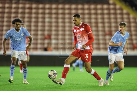 Photo for Jon Russell #3 of Barnsley breaks with the ball during the EFL Trophy match Barnsley vs Manchester City U21 at Oakwell, Barnsley, United Kingdom, 26th September 2023 - Royalty Free Image