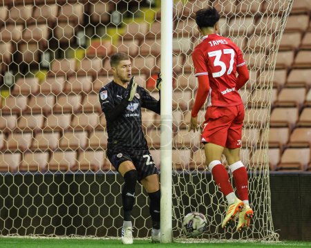 Photo for Ben Killip #23 of Barnsley covers is net during the EFL Trophy match Barnsley vs Manchester City U21 at Oakwell, Barnsley, United Kingdom, 26th September 2023 - Royalty Free Image