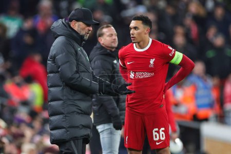 Photo for Jrgen Klopp Manager of Liverpool speaks to Trent Alexander-Arnold #66 of Liverpool during the UEFA Europa League Group E match Liverpool vs LASK at Anfield, Liverpool, United Kingdom, 30th November 2023 - Royalty Free Image