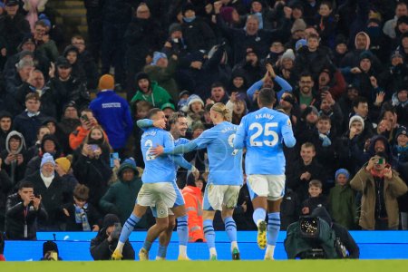 Photo for Jack Grealish #10 of Manchester City celebrates his goal to make it 3-2 during the Premier League match Manchester City vs Tottenham Hotspur at Etihad Stadium, Manchester, United Kingdom, 3rd December 2023 - Royalty Free Image