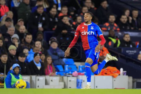Photo for Michael Olise #7 of Crystal Palace runs for the ball during the Premier League match Manchester City vs Crystal Palace at Etihad Stadium, Manchester, United Kingdom, 16th December 202 - Royalty Free Image