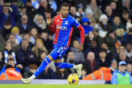 Photo for Michael Olise #7 of Crystal Palace runs for the ball during the Premier League match Manchester City vs Crystal Palace at Etihad Stadium, Manchester, United Kingdom, 16th December 202 - Royalty Free Image
