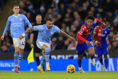 Photo for Matheus Franca #11 of Crystal Palace and Kyle Walker #2 of Manchester City chase for the ball during the Premier League match Manchester City vs Crystal Palace at Etihad Stadium, Manchester, United Kingdom, 16th December 202 - Royalty Free Image