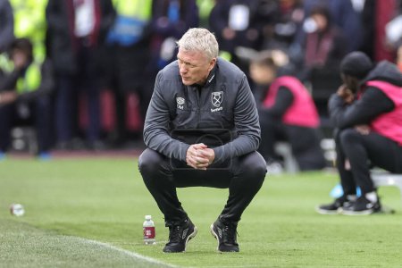 Photo for David Moyes manager of West Ham United rects after Manchester United win a free kick during the Premier League match West Ham United vs Manchester United at London Stadium, London, United Kingdom, 23rd December 202 - Royalty Free Image