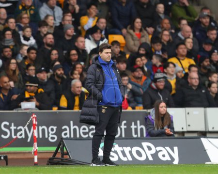 Photo for Mauricio Pochettino manager of Chelsea watches on the match, during the Premier League match Wolverhampton Wanderers vs Chelsea at Molineux, Wolverhampton, United Kingdom, 24th December 202 - Royalty Free Image