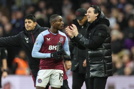 Photo for Unai Emery manager of Aston Villa speaks to Moussa Diaby of Aston Villa as they wait for a VAR decision on his goal during the Premier League match Aston Villa vs Burnley at Villa Park, Birmingham, United Kingdom, 30th December 202 - Royalty Free Image