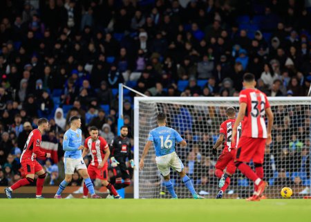 Photo for Rodri of Manchester City strikes a chance at goal, during the Premier League match Manchester City vs Sheffield United at Etihad Stadium, Manchester, United Kingdom, 30th December 202 - Royalty Free Image