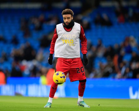 Photo for Jayden Bogle of Sheffield United warms up ahead of the match, during the Premier League match Manchester City vs Sheffield United at Etihad Stadium, Manchester, United Kingdom, 30th December 202 - Royalty Free Image