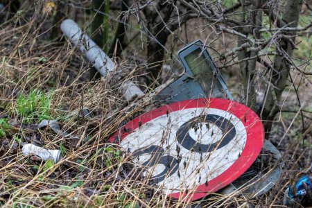 Photo for A road speed sign lies broken at the side of the flooded road caused by storms and heavy rain on the A656 near Leeds at Barnsdale Road A656, Allerton Bywater, Castleford, United Kingdom, 2nd January 2023 - Royalty Free Image