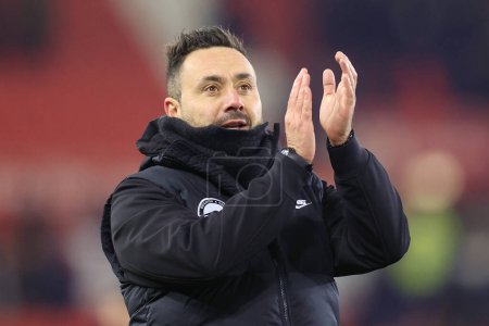 Photo for Roberto De Zerbi the Brighton & Hove Albion manager applauds the fans at the end of the Emirates FA Cup Third Round match Stoke City vs Brighton and Hove Albion at Bet365 Stadium, Stoke-on-Trent, United Kingdom, 6th January 202 - Royalty Free Image