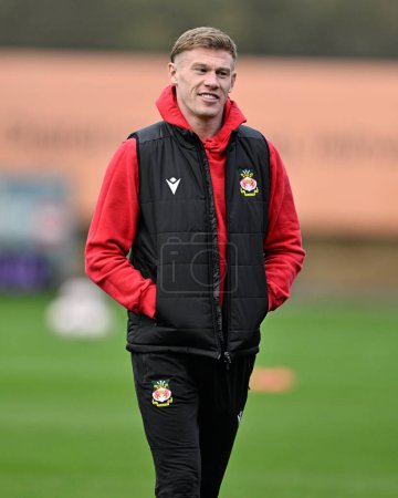 Photo for James McClean of Wrexham inspects the pitch ahead of the match, during the Emirates FA Cup Third Round match Shrewsbury Town vs Wrexham at Croud Meadow, Shrewsbury, United Kingdom, 7th January 202 - Royalty Free Image