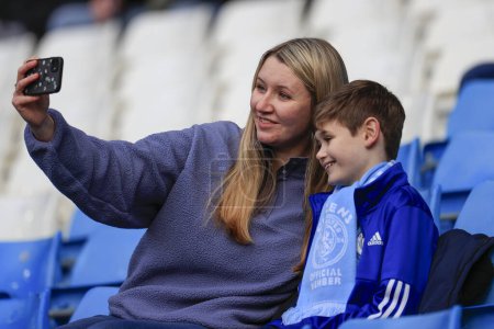 Photo for City fans taking a selfie ahead of the FA Cup Third Round match Manchester City vs Huddersfield Town at Etihad Stadium, Manchester, United Kingdom, 7th January 202 - Royalty Free Image