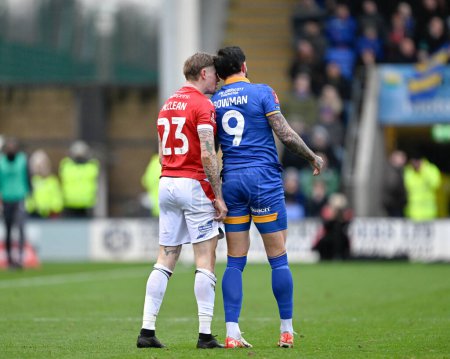 Photo for James McClean of Wrexham and Ryan Bowman of Shrewsbury Town clash, during the Emirates FA Cup Third Round match Shrewsbury Town vs Wrexham at Croud Meadow, Shrewsbury, United Kingdom, 7th January 202 - Royalty Free Image