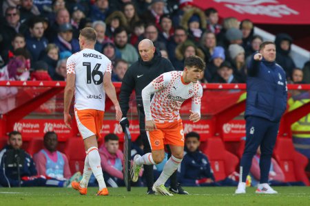 Photo for Jordan Rhodes of Blackpool comes off for Kyle Joseph of Blackpool during the Emirates FA Cup Third Round match Nottingham Forest vs Blackpool at City Ground, Nottingham, United Kingdom, 7th January 202 - Royalty Free Image