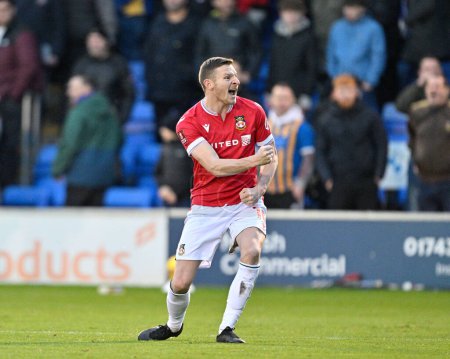 Photo for Paul Mullin of Wrexham celebrates the full time result, during the Emirates FA Cup Third Round match Shrewsbury Town vs Wrexham at Croud Meadow, Shrewsbury, United Kingdom, 7th January 202 - Royalty Free Image