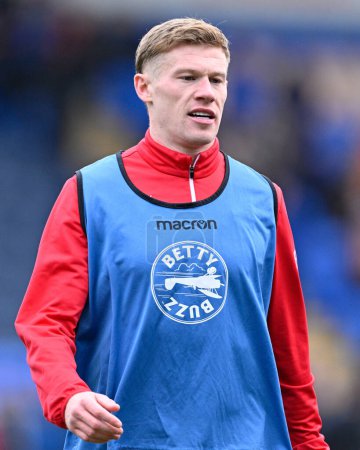 Photo for James McClean of Wrexham warms up ahead of the match, during the Emirates FA Cup Third Round match Shrewsbury Town vs Wrexham at Croud Meadow, Shrewsbury, United Kingdom, 7th January 202 - Royalty Free Image